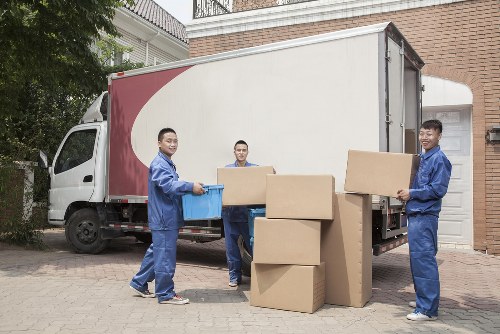 Removal team planning a move in a Pimlico street