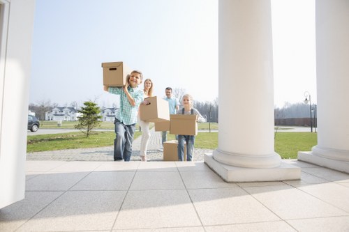 Boxes and household furniture arranged for a Pimlico relocation