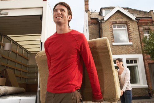Packed boxes and furniture ready for a Pimlico moving truck service
