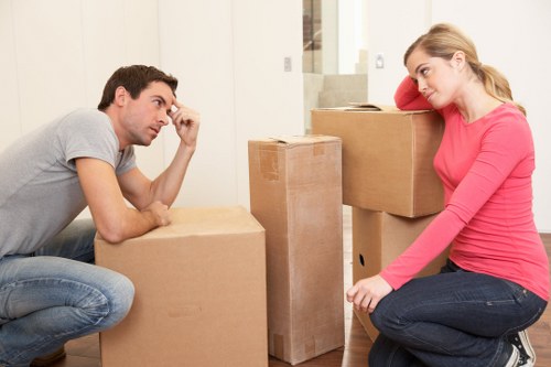 Local van service preparing boxes and furniture for transport in Pimlico